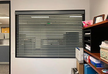 A view of sleek commercial spaces enhanced with modern aluminum blinds.