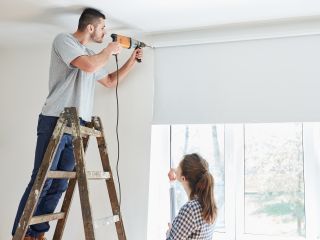 Skilled Technicians Repairing Window Coverings in Yorba Linda